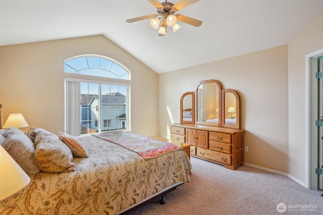 bedroom featuring a ceiling fan, baseboards, carpet, and vaulted ceiling