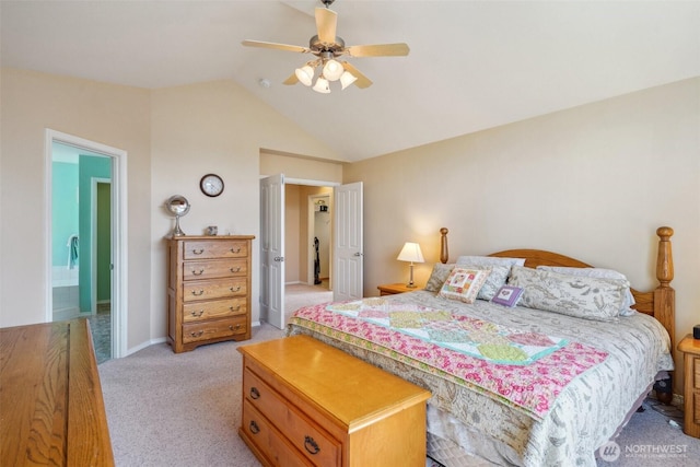 bedroom featuring baseboards, ceiling fan, vaulted ceiling, and light colored carpet