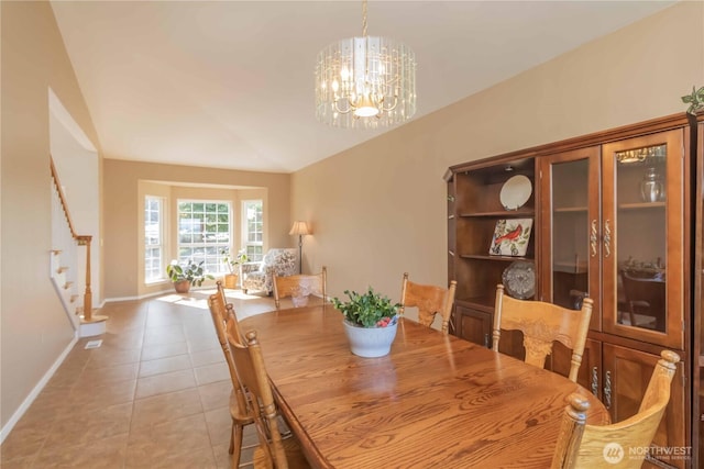 5801 51st Avenue Ct E, Tacoma, WA 98443 - dining room with baseboards, light tile patterned floors, a notable chandelier, and stairway