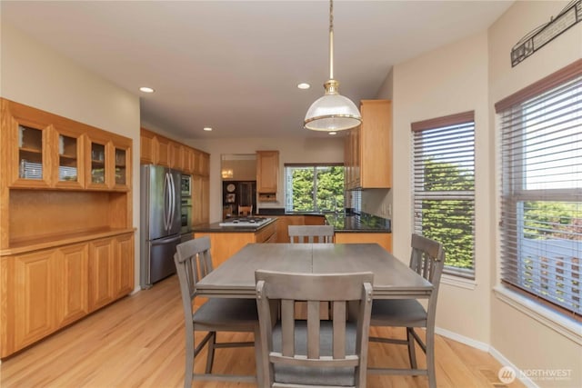 5801 51st Avenue Ct E, Tacoma, WA 98443 - dining area featuring light wood-style floors, baseboards, and recessed lighting