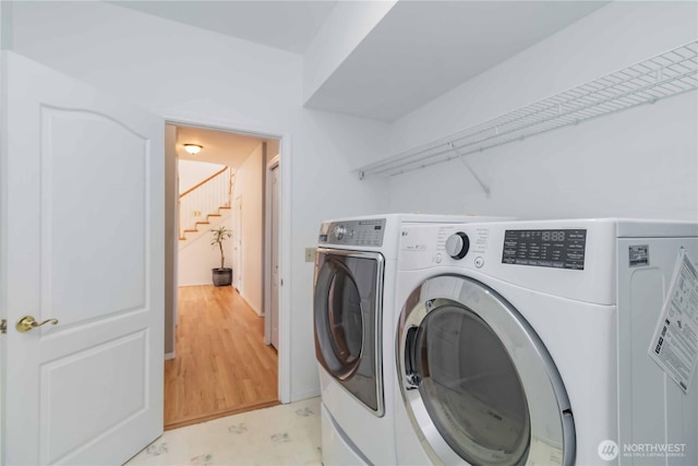 5801 51st Avenue Ct E, Tacoma, WA 98443 - washroom with laundry area and washing machine and dryer