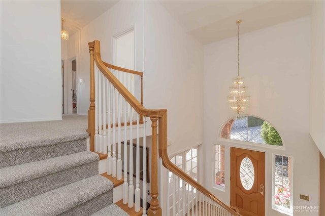 5801 51st Avenue Ct E, Tacoma, WA 98443 - entryway featuring an inviting chandelier, a towering ceiling, and stairway