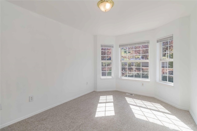 5801 51st Avenue Ct E, Tacoma, WA 98443 - unfurnished room featuring carpet flooring, baseboards, and visible vents