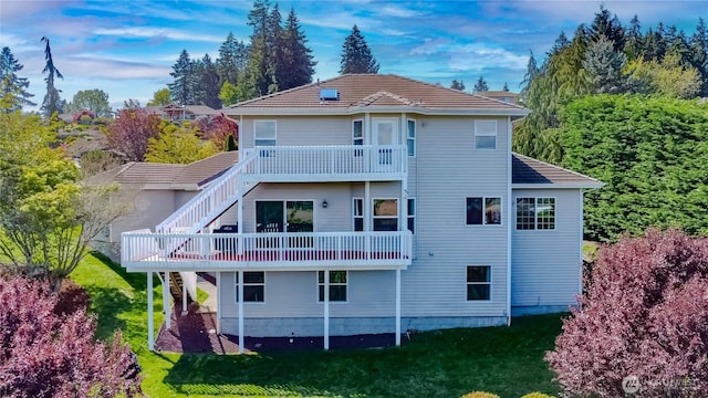5801 51st Avenue Ct E, Tacoma, WA 98443 - back of house with stairway, a deck, and a lawn
