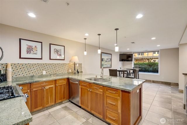 109 2nd St S Unit 523, Kirkland, WA 98033 - kitchen featuring a sink, tasteful backsplash, a peninsula, and light tile patterned flooring