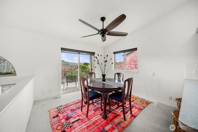 351 19th St NE Unit 10, East Wenatchee, WA 98802 - carpeted dining space with a ceiling fan and lofted ceiling