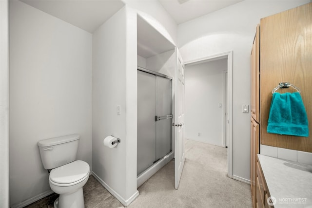 351 19th St NE Unit 10, East Wenatchee, WA 98802 - bathroom with vanity, toilet, and a stall shower