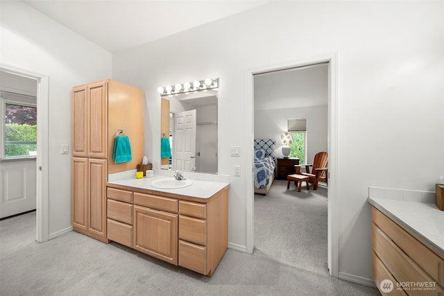 351 19th St NE Unit 10, East Wenatchee, WA 98802 - bathroom with carpet floors, plenty of natural light, vanity, and connected bathroom