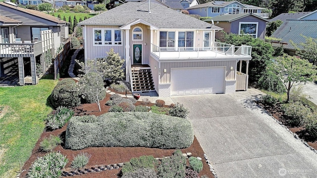 2279 Elger Park Rd, Camano Island, WA 98282 - view of front of house featuring stairs, concrete driveway, a residential view, and an attached garage