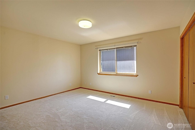 2279 Elger Park Rd, Camano Island, WA 98282 - unfurnished bedroom featuring carpet, baseboards, and a closet