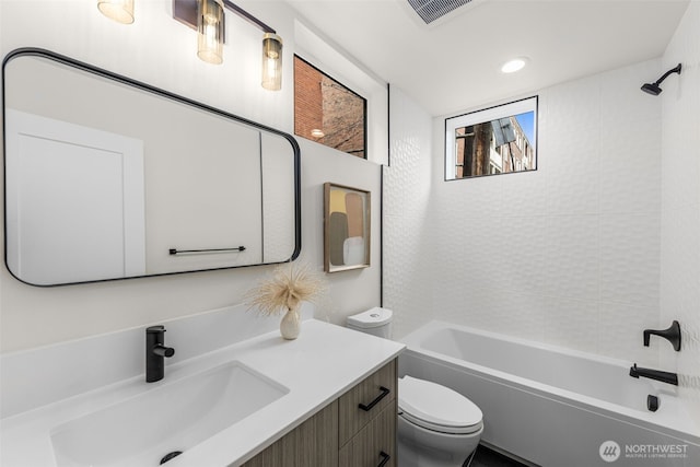 1124C 13th Ave, Seattle, WA 98122 - full bath featuring vanity, toilet, shower / washtub combination, and recessed lighting