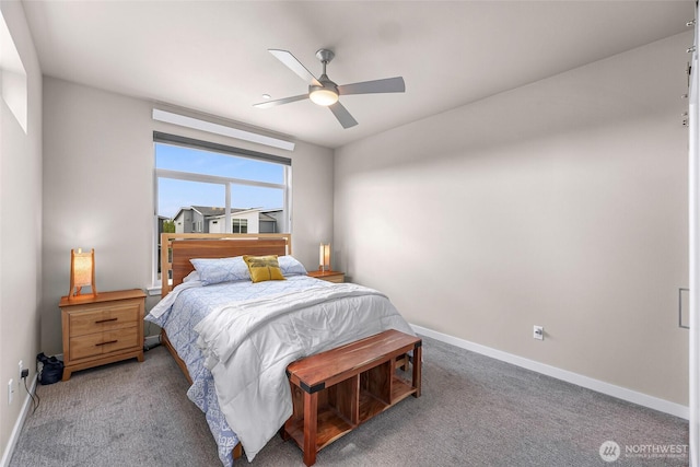 bedroom with carpet floors, a ceiling fan, and baseboards