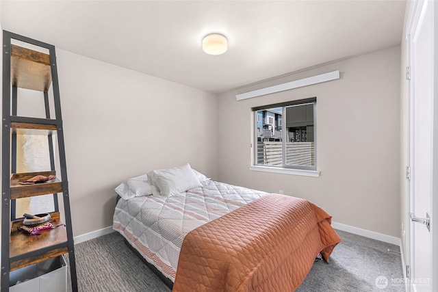 carpeted bedroom with baseboards