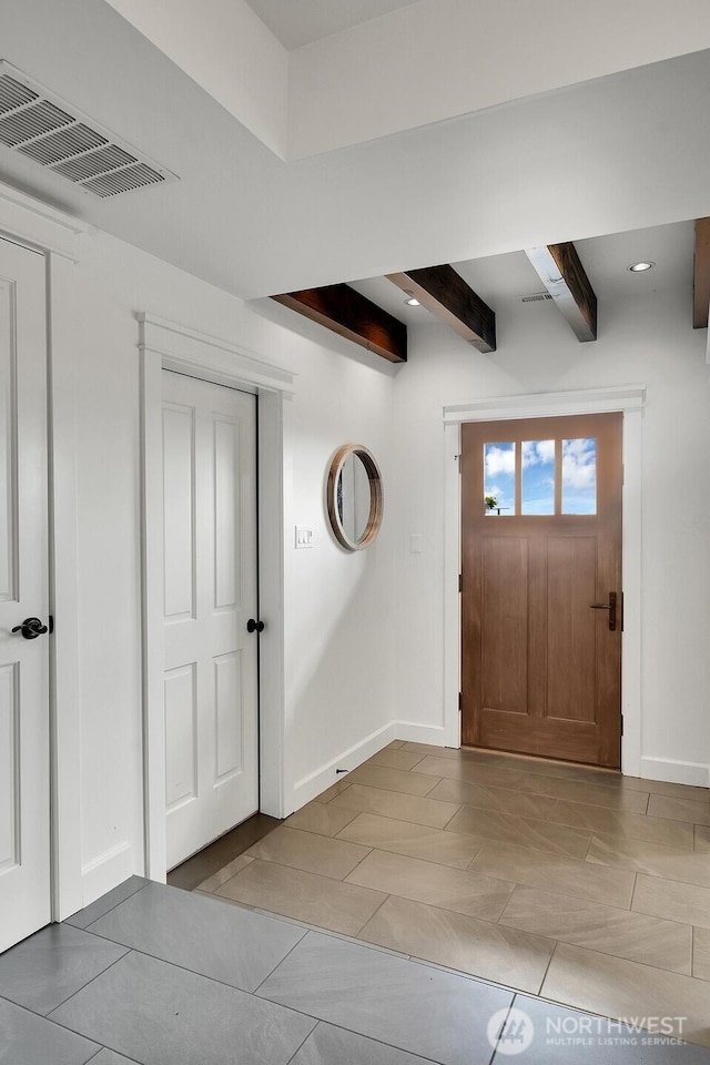 3122 SW 172nd St, Burien, WA 98166 - foyer entrance featuring beam ceiling, baseboards, tile patterned floors, and recessed lighting