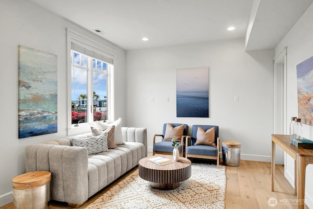 3122 SW 172nd St, Burien, WA 98166 - living room featuring baseboards, light wood-style floors, and recessed lighting