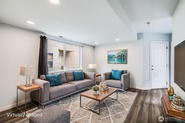 living area with baseboards, recessed lighting, wood finished floors, and visible vents