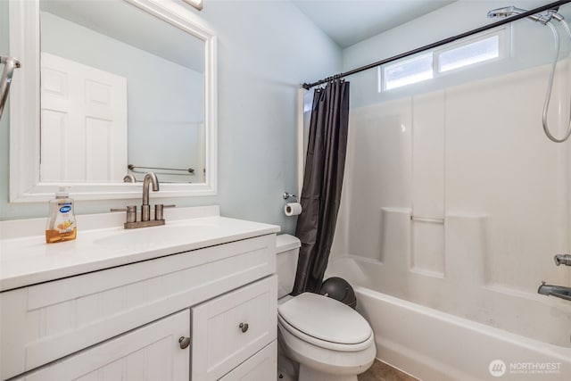 full bath with vanity, shower / bathtub combination with curtain, and toilet