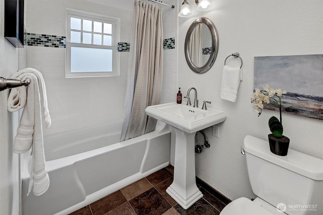 10841 NE 108th St, Kirkland, WA 98033 - full bathroom with baseboards, shower / bath combination with curtain, toilet, and stone finish floor