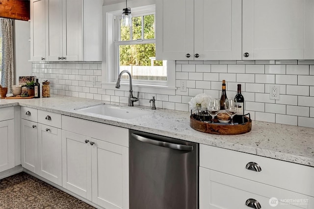 10841 NE 108th St, Kirkland, WA 98033 - kitchen with white cabinets, light stone countertops, a sink, dishwasher, and tasteful backsplash