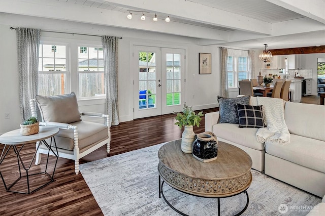10841 NE 108th St, Kirkland, WA 98033 - living area with baseboards, dark wood-style flooring, french doors, and beam ceiling