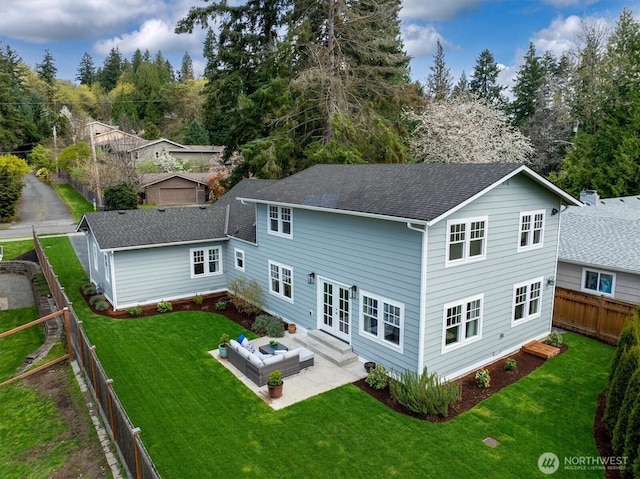 10841 NE 108th St, Kirkland, WA 98033 - rear view of property featuring a shingled roof, french doors, a fenced backyard, a patio area, and a lawn
