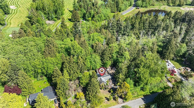 bird's eye view with a water view and golf course view