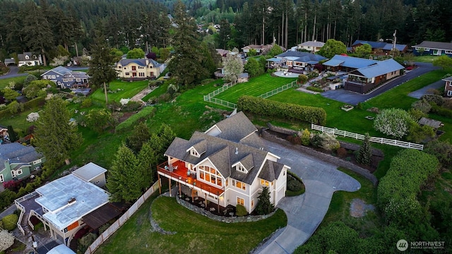 aerial view with a view of trees and a residential view