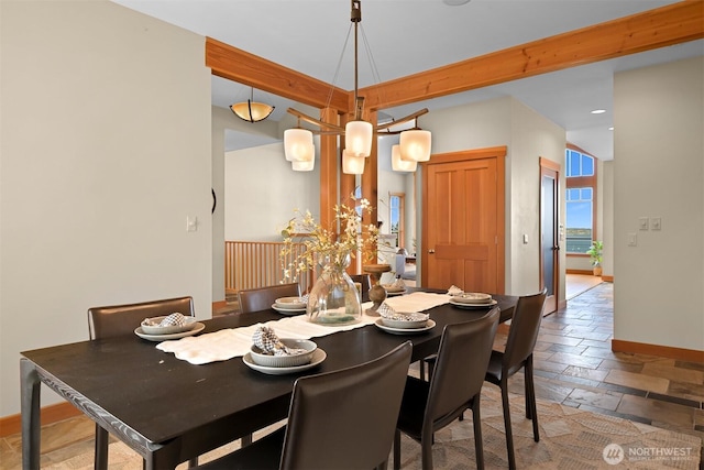 dining area with baseboards, recessed lighting, and stone tile floors