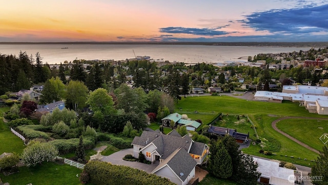 birds eye view of property featuring a water view