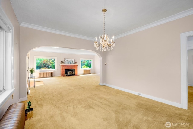 437 NW Pennsylvania Ave, Chehalis, WA 98532 - interior space featuring arched walkways, radiator, carpet flooring, and ornamental molding