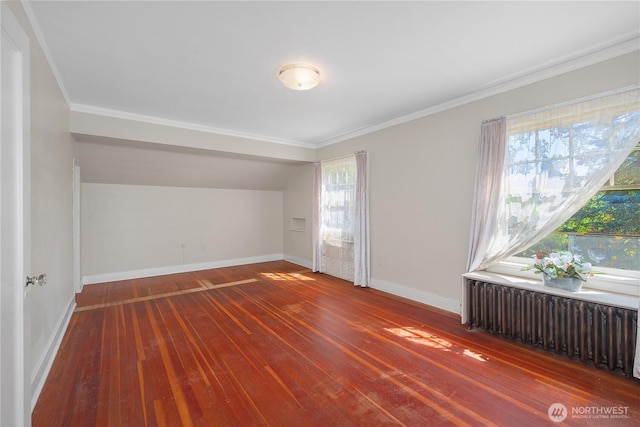 437 NW Pennsylvania Ave, Chehalis, WA 98532 - unfurnished bedroom featuring baseboards, ornamental molding, radiator heating unit, and hardwood / wood-style floors