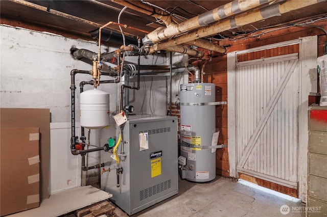 437 NW Pennsylvania Ave, Chehalis, WA 98532 - utilities with strapped water heater and a heating unit
