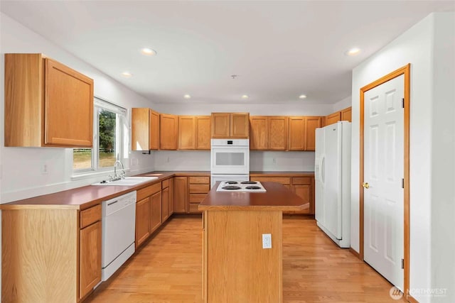 300 Range View Rd, Ellensburg, WA 98926 - kitchen featuring white appliances, a sink, a kitchen island, light wood-style flooring, and recessed lighting