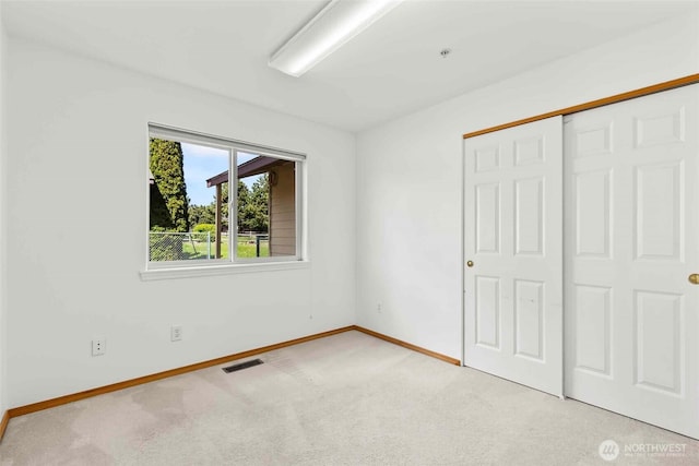 300 Range View Rd, Ellensburg, WA 98926 - unfurnished bedroom featuring light colored carpet, baseboards, and a closet