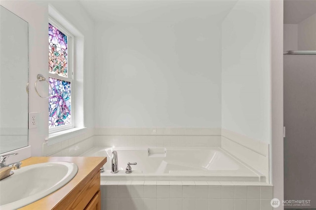 300 Range View Rd, Ellensburg, WA 98926 - full bathroom featuring vanity, a garden tub, and healthy amount of natural light