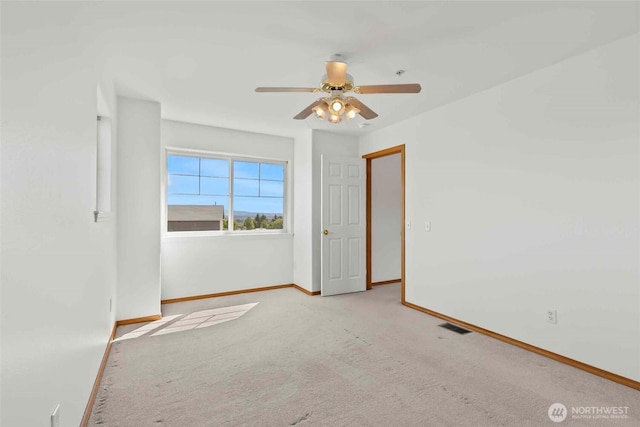 300 Range View Rd, Ellensburg, WA 98926 - unfurnished room with baseboards, ceiling fan, and light colored carpet