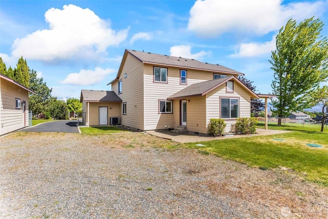 300 Range View Rd, Ellensburg, WA 98926 - rear view of house featuring a yard, central air condition unit, and driveway