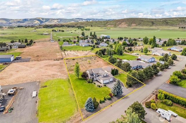 300 Range View Rd, Ellensburg, WA 98926 - aerial perspective of suburban area with property boundaries highlighted and a mountainous background