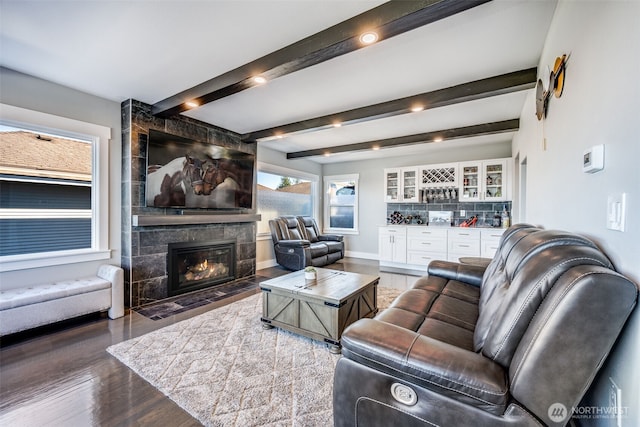 3012 N 30th St, Tacoma, WA 98407 - living room with a fireplace, baseboards, wood finished floors, indoor bar, and beamed ceiling