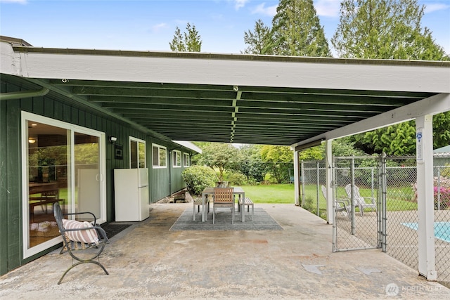 13203 436th Ave SE, North Bend, WA 98045 - view of patio / terrace featuring fence, a gate, and outdoor dining area