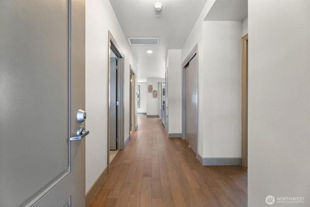4961 Main St Unit 612, Tacoma, WA 98407 - hall featuring baseboards, light wood-style flooring, and recessed lighting