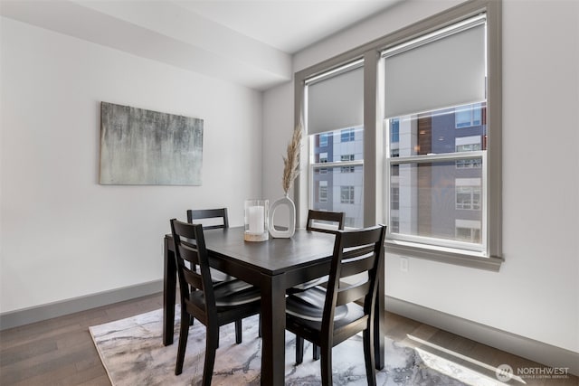 4961 Main St Unit 612, Tacoma, WA 98407 - dining room featuring wood finished floors and baseboards