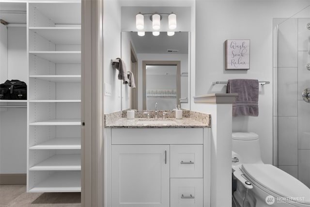 4961 Main St Unit 612, Tacoma, WA 98407 - bathroom with toilet, vanity, and a shower stall