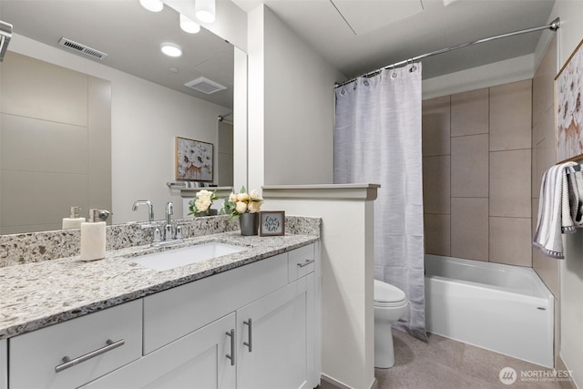 4961 Main St Unit 612, Tacoma, WA 98407 - full bathroom featuring vanity, toilet, and shower / bath combo with shower curtain