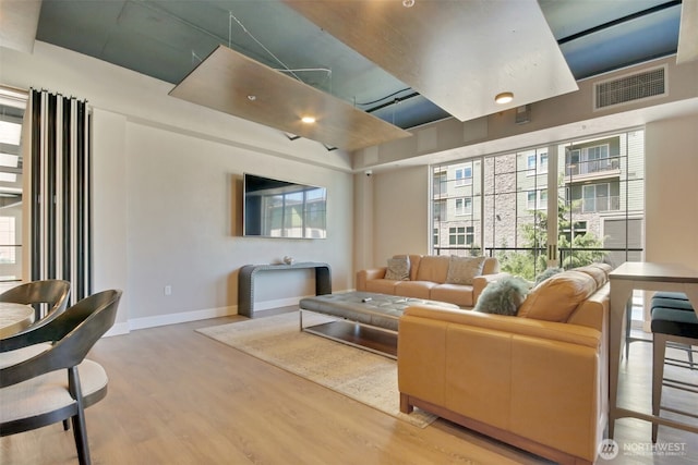 4961 Main St Unit 612, Tacoma, WA 98407 - living area featuring wood finished floors and baseboards