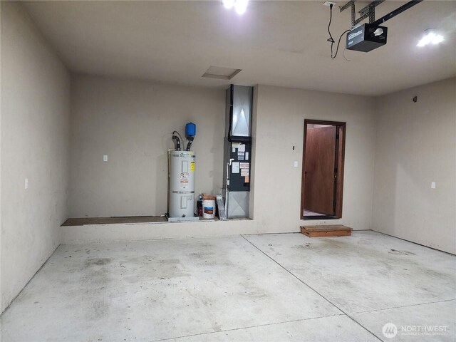 garage featuring heating unit, a garage door opener, and electric water heater