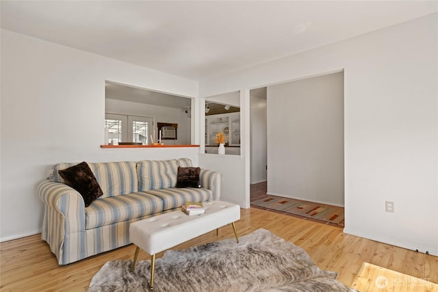 177 Salmon Creek Rd, Okanogan, WA 98840 - living room featuring baseboards and wood finished floors
