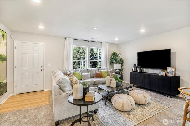 living room with baseboards, carpet flooring, and recessed lighting
