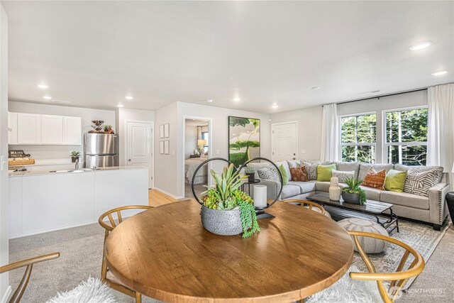 dining space with recessed lighting