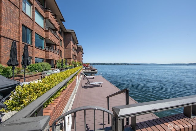 dock area featuring a water view